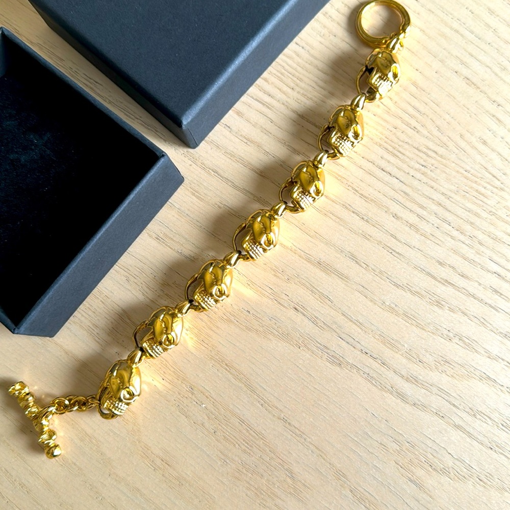 Gold toned skull bracelet